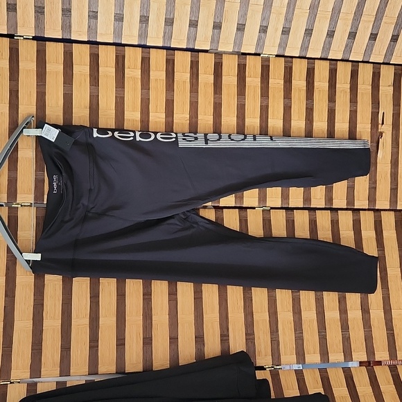 NWT!! BEBE LEGGINGS SILVER WRITING - Picture 1 of 11